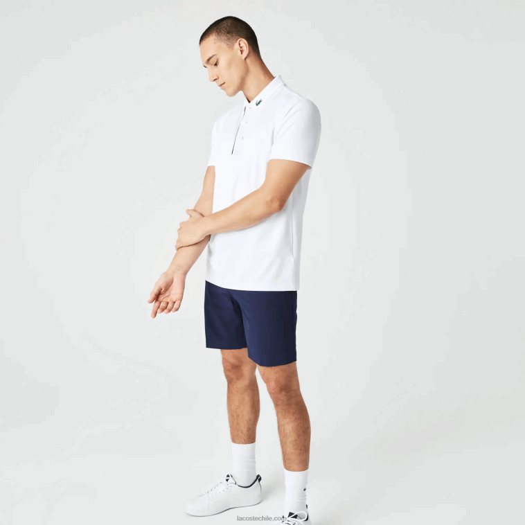 hombres Lacoste blanco azul marino 522 polo de golf de punto deportivo N6XZ2595
