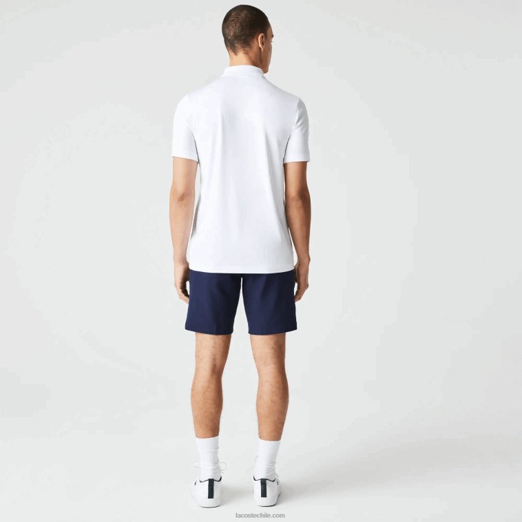 hombres Lacoste blanco azul marino 522 polo de golf de punto deportivo N6XZ2595