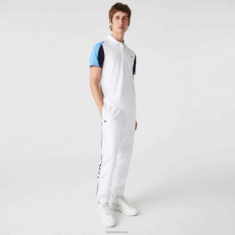 hombres Lacoste blanco azul marino 5yp Polo deportivo de tenis de piqué resistente a las carreras de ajuste regular N6XZ2556