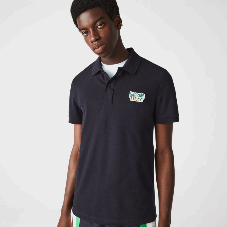 hombres Lacoste fondo azul marino polo de corte regular de piqué de algodón con insignia N6XZ2912
