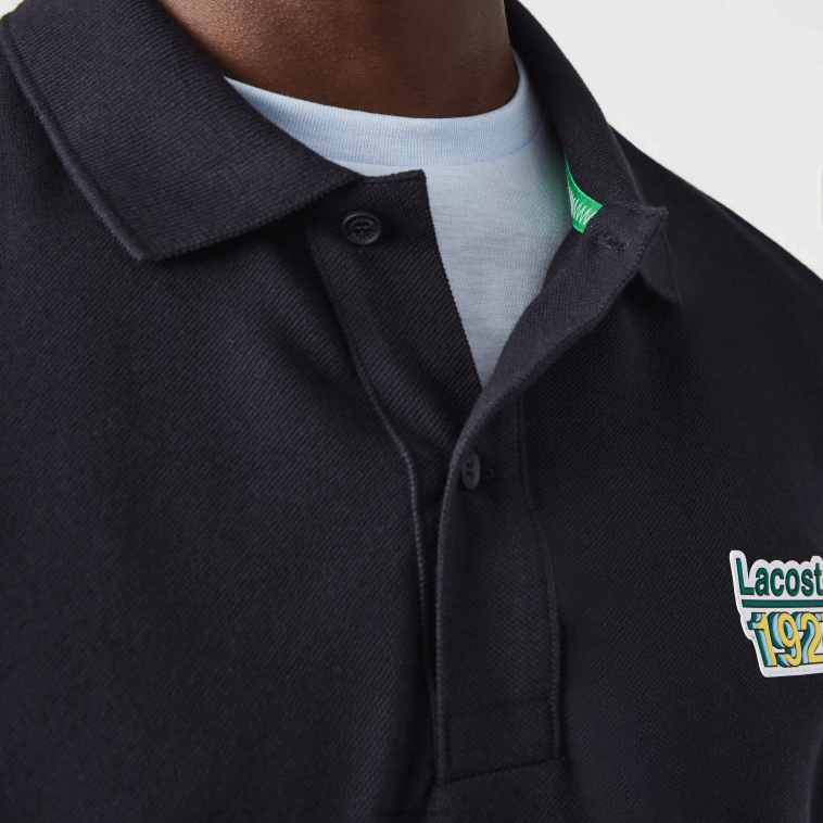 hombres Lacoste fondo azul marino polo de corte regular de piqué de algodón con insignia N6XZ2912