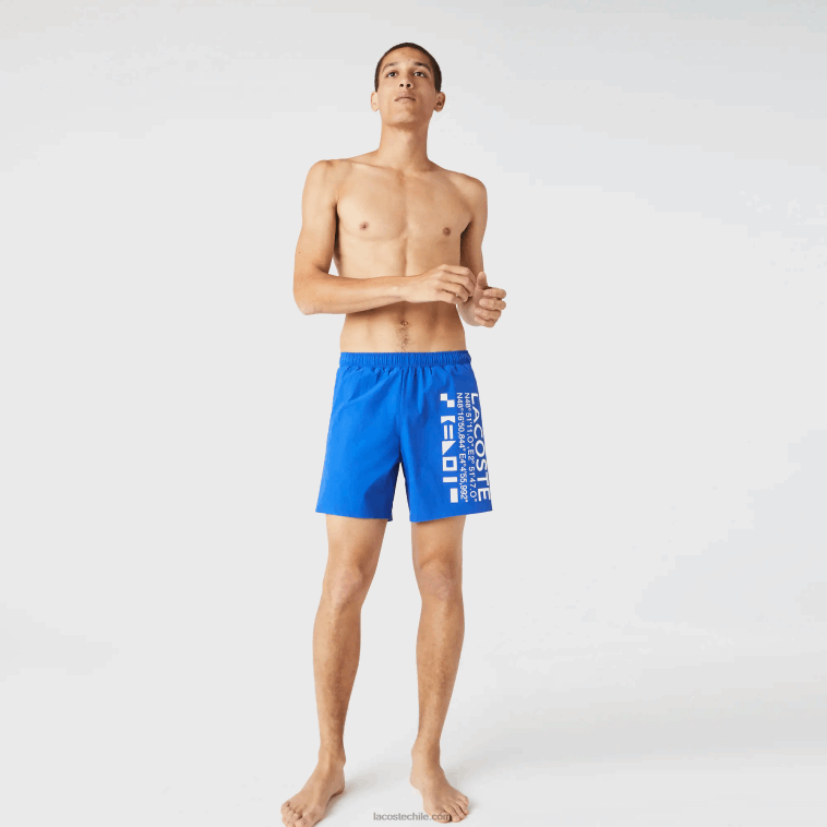 hombres Lacoste azul blanco 7lc shorts de playa con estampado náutico N6XZ21661 hombres Lacoste azul blanco 7lc shorts de playa con estampado náutico N6XZ21661
