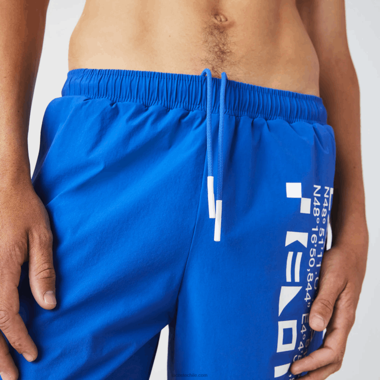 hombres Lacoste azul blanco 7lc shorts de playa con estampado náutico N6XZ21661