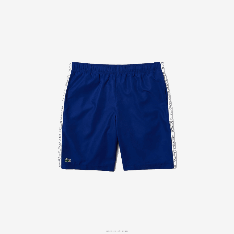 hombres Lacoste azul blanco emj shorts deportivos con franjas laterales N6XZ21505