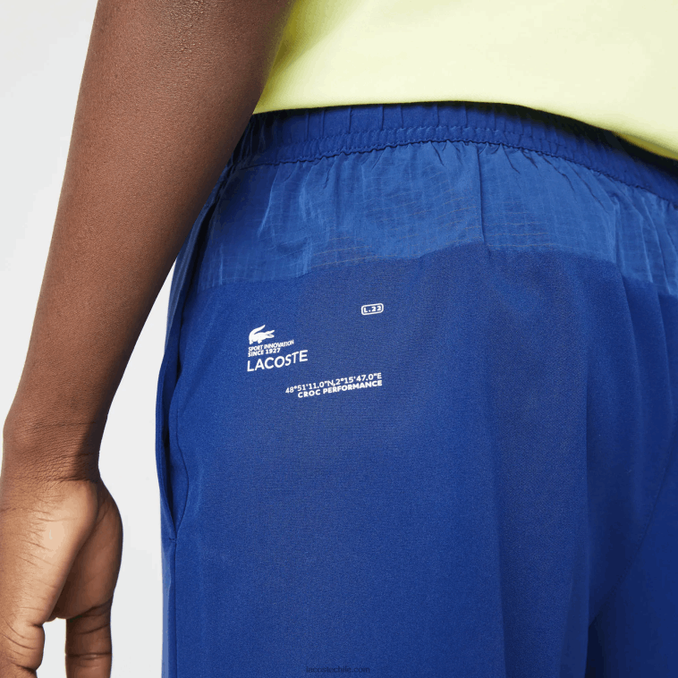 hombres Lacoste azul llamativo amarillo blanco 8q6 shorts deportivos a capas N6XZ21544