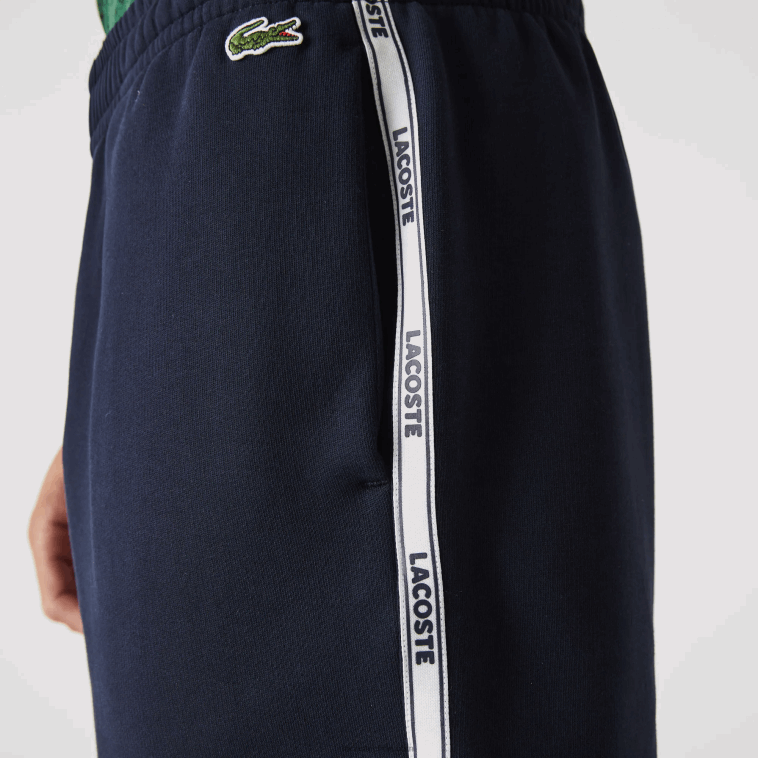 hombres Lacoste azul marino 166 shorts de mezcla de vellón con bandas de la marca N6XZ21538