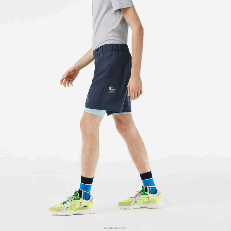 hombres Lacoste azul verde claro b00 pantalones cortos deportivos de dos tonos con calzoncillos incorporados N6XZ2480