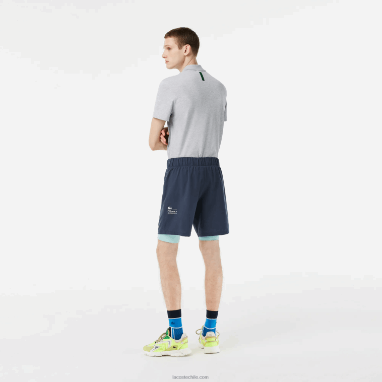 hombres Lacoste azul verde claro b00 pantalones cortos deportivos de dos tonos con calzoncillos incorporados N6XZ2480