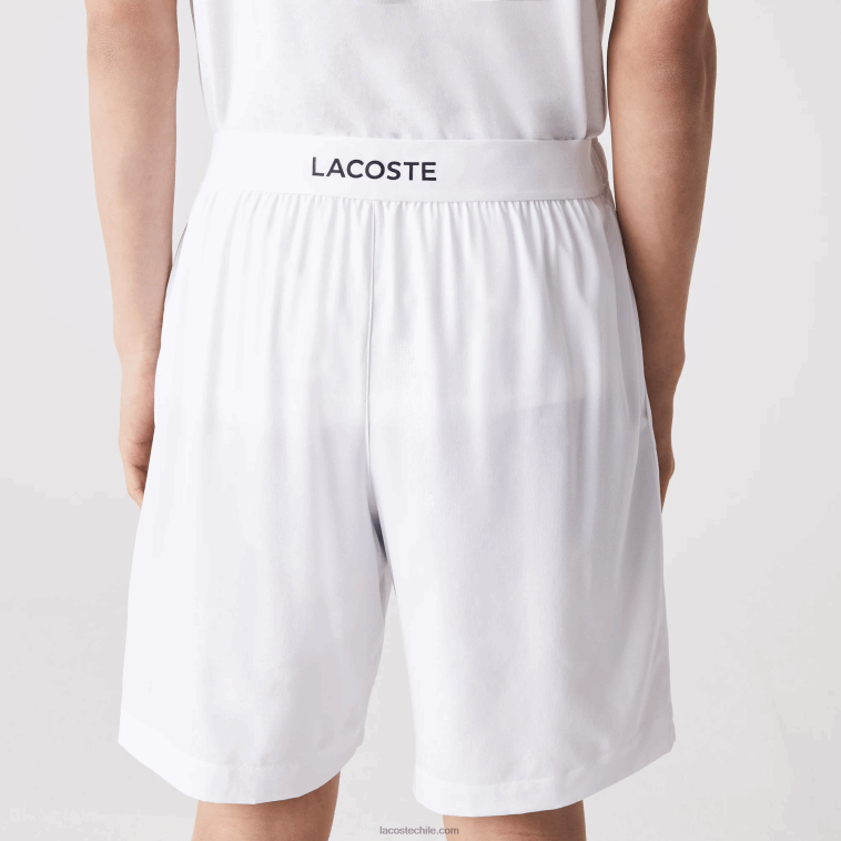 hombres Lacoste blanco azul marino 522 pantalones cortos deportivos ultraligeros N6XZ21409