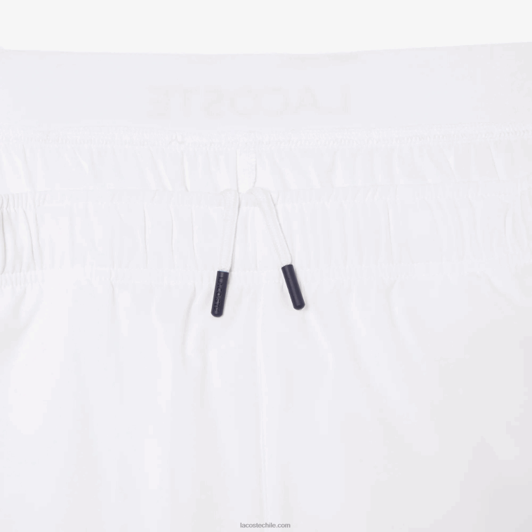 hombres Lacoste blanco azul marino 522 pantalones cortos deportivos ultraligeros N6XZ21409