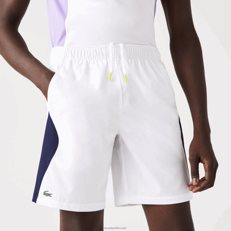 hombres Lacoste blanco azul marino 522 shorts de tenis sport regular fit sin costuras N6XZ21330