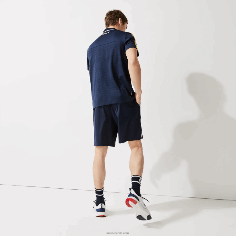 hombres Lacoste blanco azul marino r20 shorts deportivos ligeros y elásticos de edición abierta francesa N6XZ21546