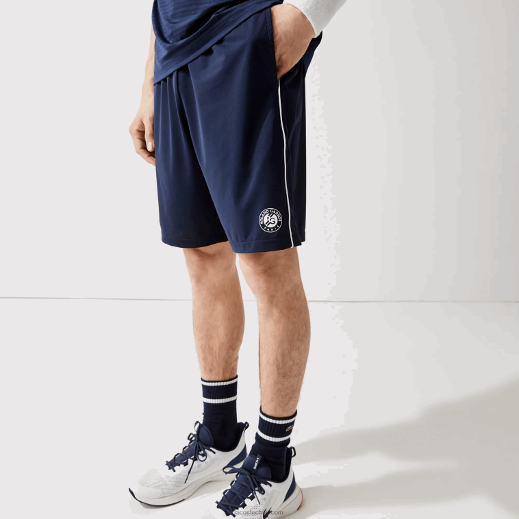 hombres Lacoste blanco azul marino r20 shorts deportivos ligeros y elásticos de edición abierta francesa N6XZ21546