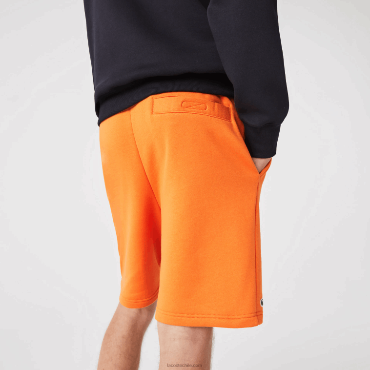 hombres Lacoste naranja tv1 pantalones cortos deportivos de tenis N6XZ21577