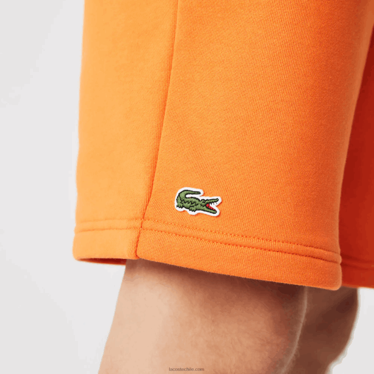 hombres Lacoste naranja tv1 pantalones cortos deportivos de tenis N6XZ21577
