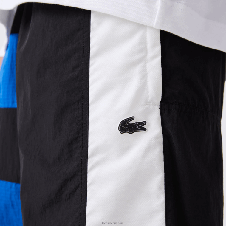 hombres Lacoste negro azul blanco se1 shorts con efecto patchwork y bloques de color N6XZ21500