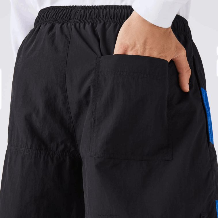 hombres Lacoste negro azul blanco se1 shorts con efecto patchwork y bloques de color N6XZ21500