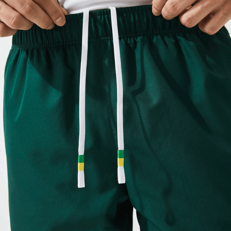 hombres Lacoste verde amarillo blanco 117 shorts deportivos ligeros con bandas en contraste N6XZ21362