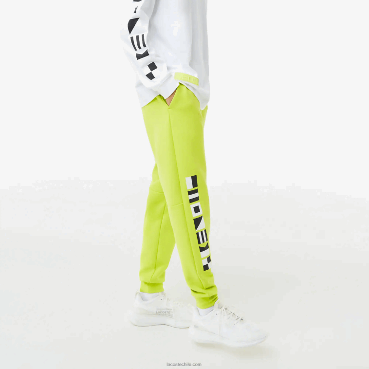 hombres Lacoste amarillo 90v pantalones de chándal con estampado reflectante N6XZ21046