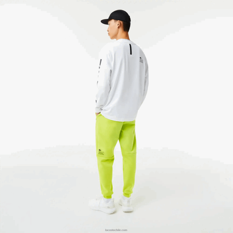 hombres Lacoste amarillo 90v pantalones de chándal con estampado reflectante N6XZ21046