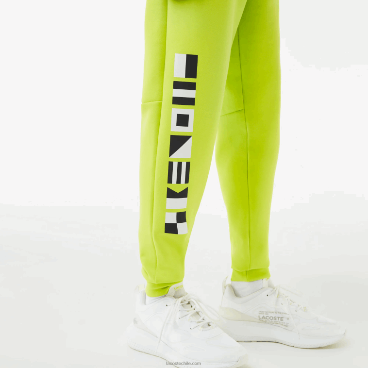 hombres Lacoste amarillo 90v pantalones de chándal con estampado reflectante N6XZ21046