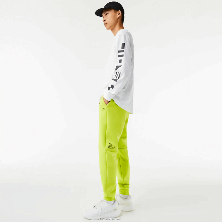 hombres Lacoste amarillo 90v pantalones de chándal con estampado reflectante N6XZ21046