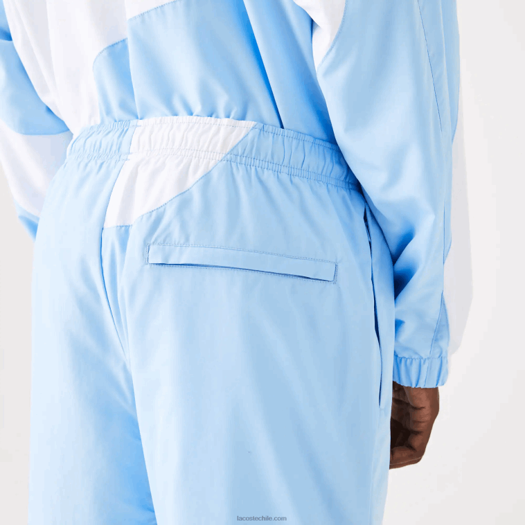hombres Lacoste azul blanco e7b pantalones de chándal con estampado Heritage N6XZ21071