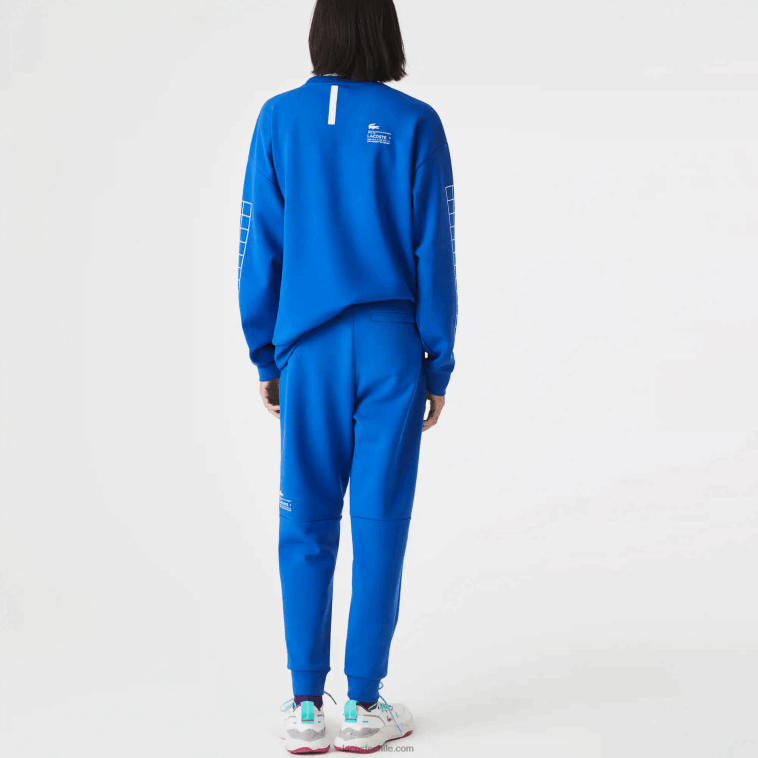 hombres Lacoste azul k1q pantalones de chándal de corte slim con logo N6XZ2975