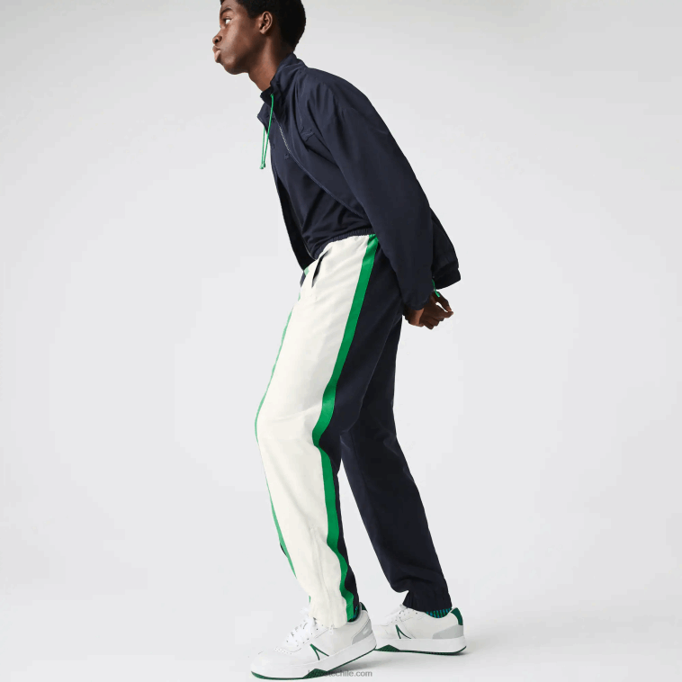 hombres Lacoste azul marino blanco verde 19v pantalones de chándal ligeros repelentes al agua con bloques de color N6XZ21180 hombres Lacoste azul marino blanco verde 19v pantalones de chándal ligeros repelentes al agua con bloques de color N6XZ21180