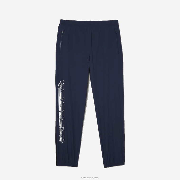 hombres Lacoste kxe azul pantalones de chándal elásticos e impermeables N6XZ2336