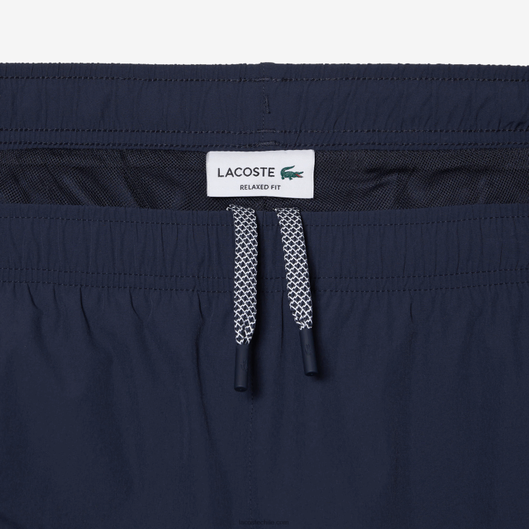 hombres Lacoste kxe azul pantalones de chándal elásticos e impermeables N6XZ2336