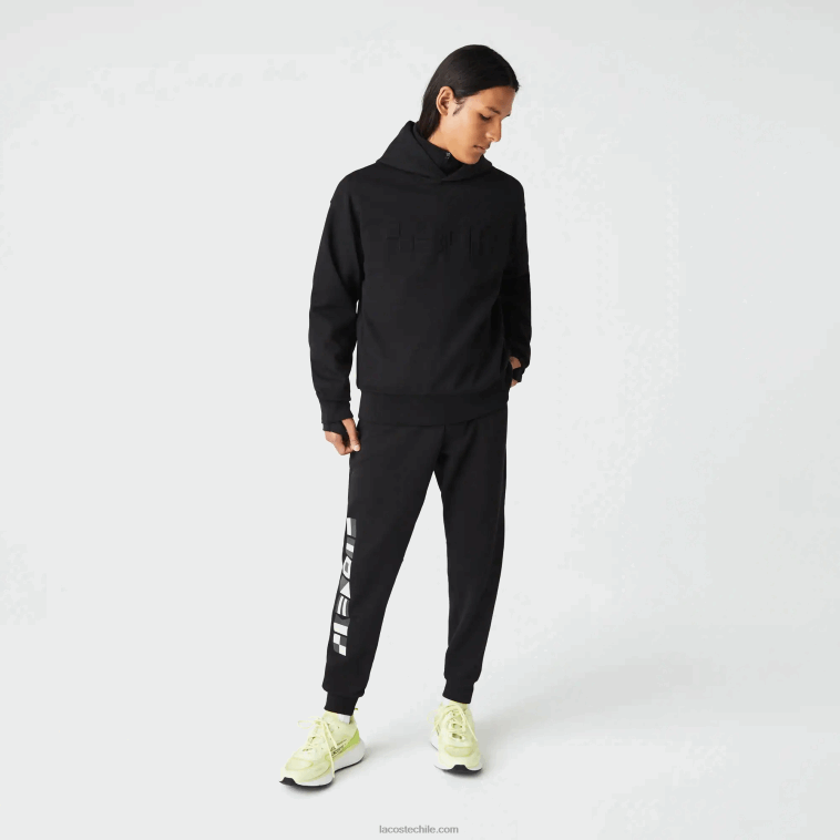 hombres Lacoste negro 031 pantalones de chándal con estampado reflectante N6XZ21043