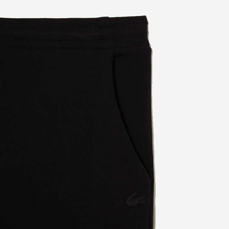 hombres Lacoste negro 031 pantalones de chándal slim fit en mezcla de algodón jaspeado N6XZ21004