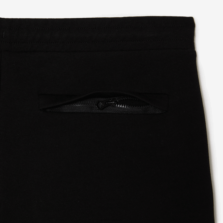 hombres Lacoste negro 031 pantalones de chándal slim fit en mezcla de algodón jaspeado N6XZ21004