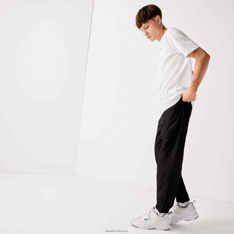 hombres Lacoste negro 031 pantalones de chándal sport tennis de tafetán con tejido de rombos N6XZ21113