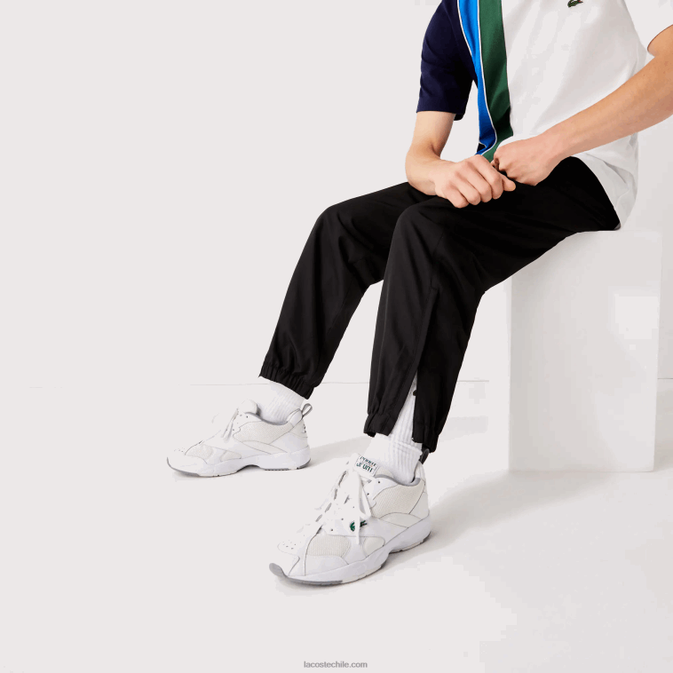 hombres Lacoste negro 031 pantalones de chándal sport tennis de tafetán con tejido de rombos N6XZ21113