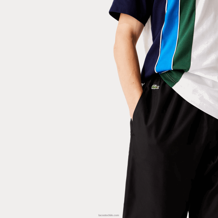 hombres Lacoste negro 031 pantalones de chándal sport tennis de tafetán con tejido de rombos N6XZ21113