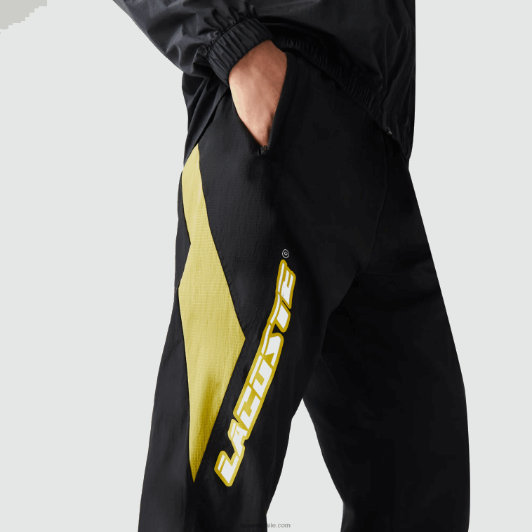 hombres Lacoste negro amarillo n07 pantalones de chándal heritage regular fit con bloques de color N6XZ21110