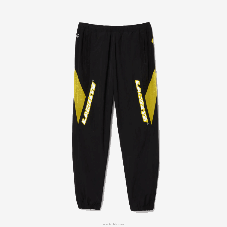 hombres Lacoste negro amarillo n07 pantalones de chándal heritage regular fit con bloques de color N6XZ21110