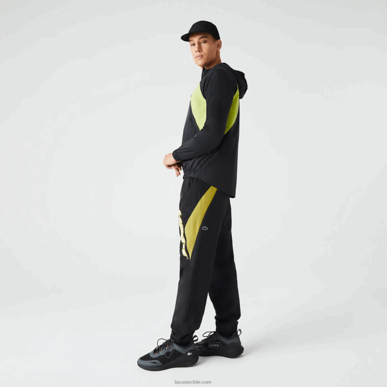 hombres Lacoste negro amarillo n07 pantalones de chándal heritage regular fit con bloques de color N6XZ21110