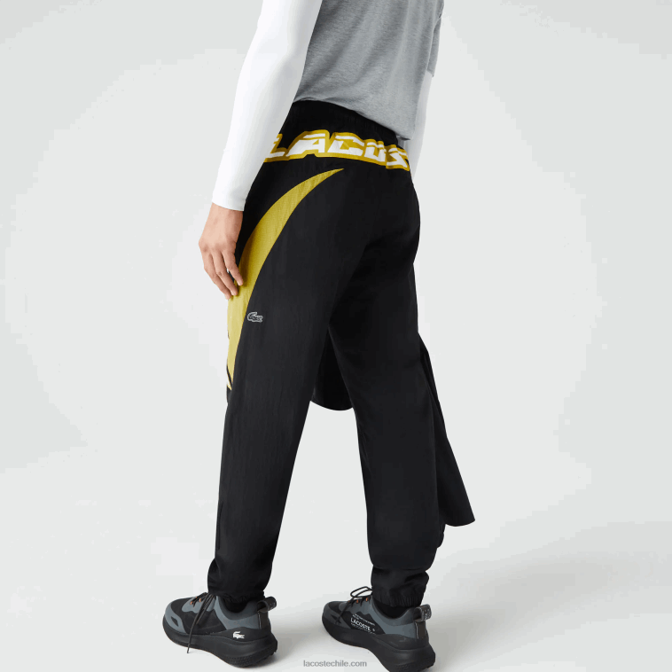 hombres Lacoste negro amarillo n07 pantalones de chándal heritage regular fit con bloques de color N6XZ21110