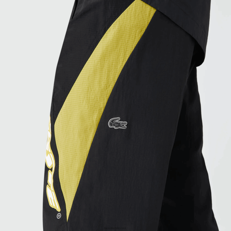 hombres Lacoste negro amarillo n07 pantalones de chándal heritage regular fit con bloques de color N6XZ21110