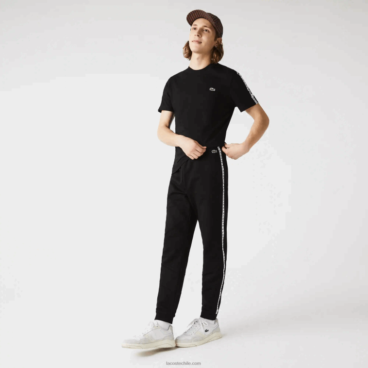 hombres Lacoste negro 8vm pantalones de chándal de vellón con bloques de color a rayas de la firma N6XZ21147 hombres Lacoste negro 8vm pantalones de chándal de vellón con bloques de color a rayas de la firma N6XZ21147
