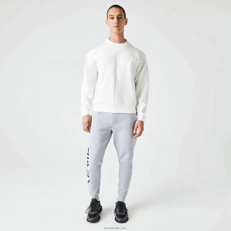 hombres Lacoste blanco nueva york sudadera holgada con efecto patchwork N6XZ2955
