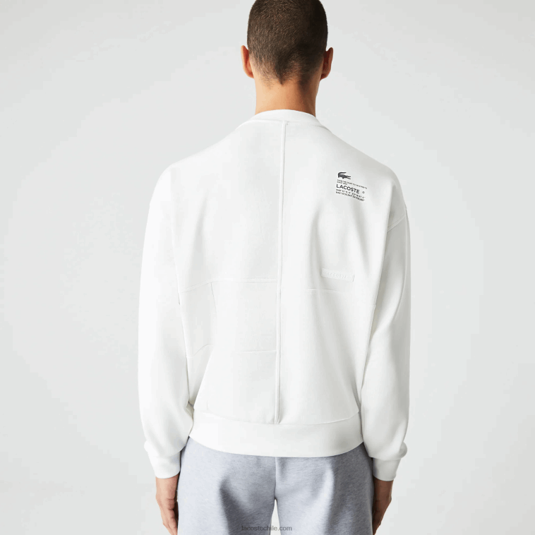 hombres Lacoste blanco nueva york sudadera holgada con efecto patchwork N6XZ2955
