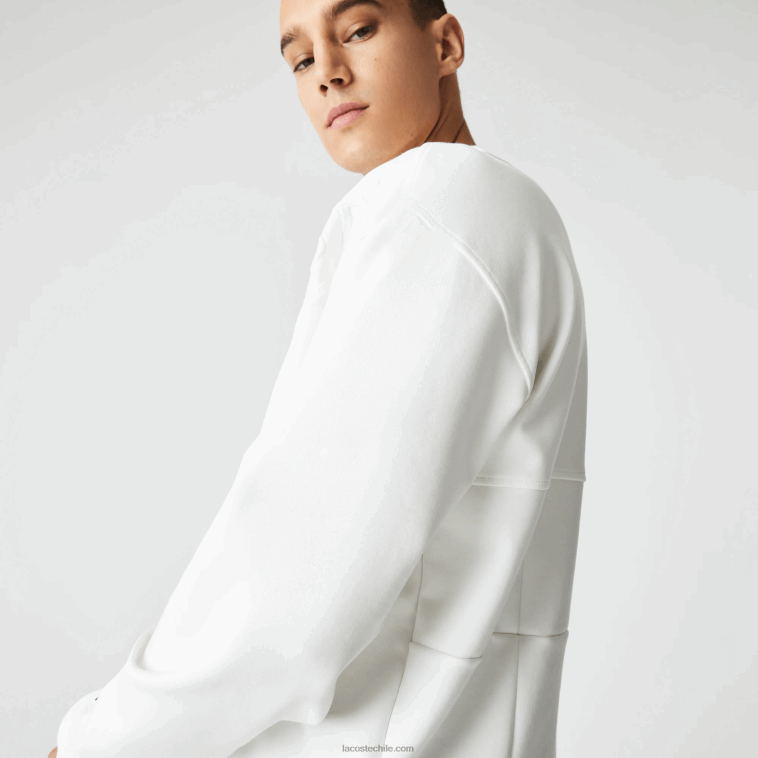 hombres Lacoste blanco nueva york sudadera holgada con efecto patchwork N6XZ2955