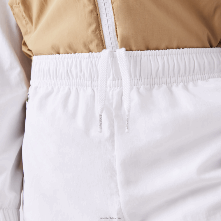 niños Lacoste beige blanco wn5 pantalones de chándal con banda en contraste N6XZ23224